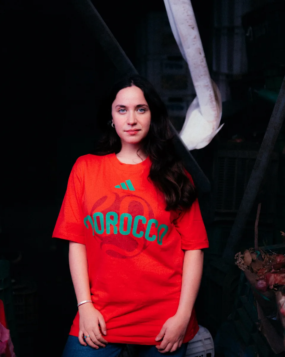 Adidas portrait in a red shirt