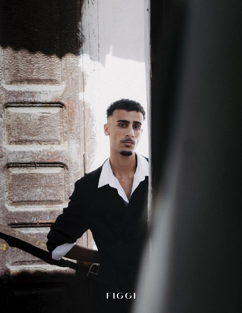 Figgi portrait in a dark suit