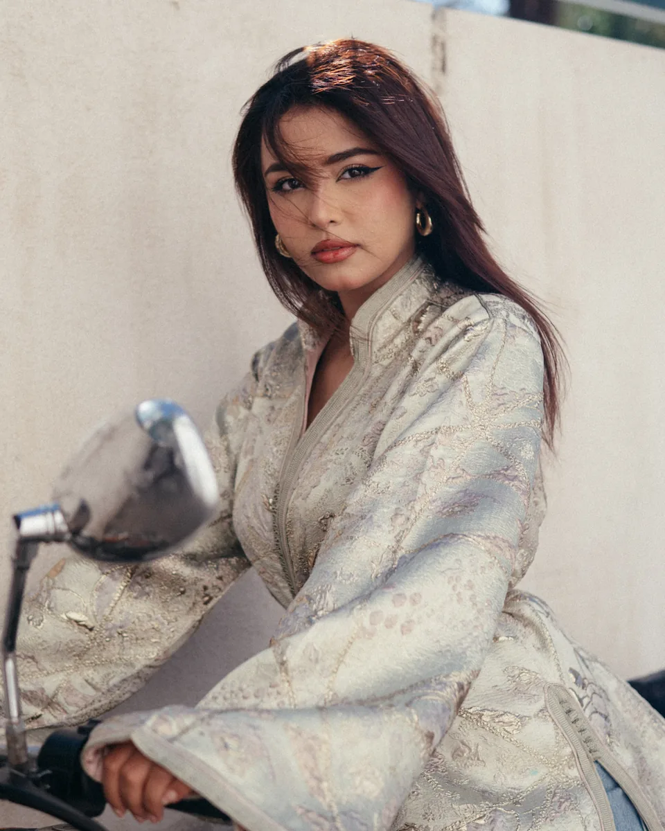 Seated Maison Radieuse portrait