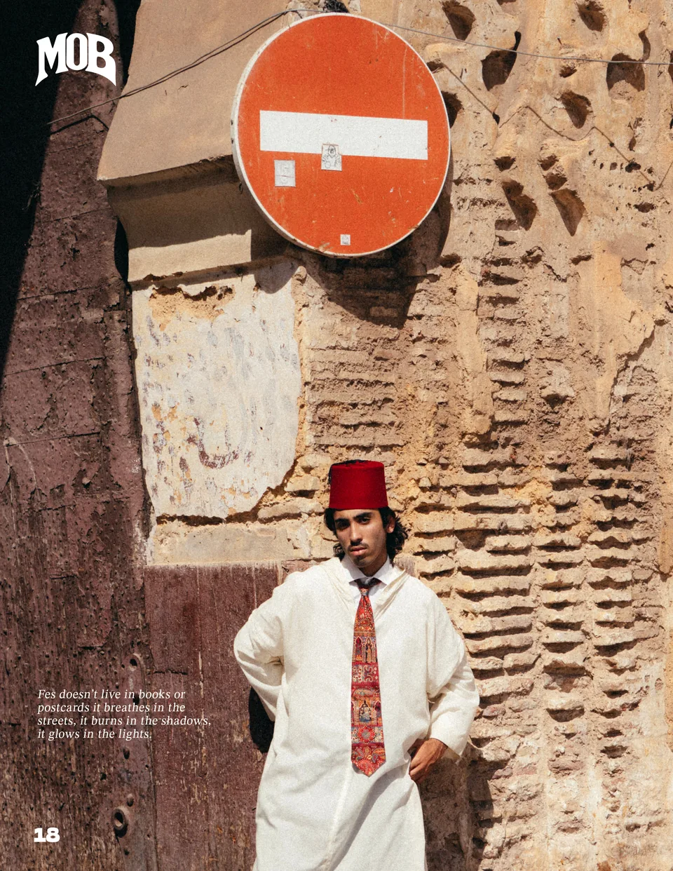 MOB portrait beside a street sign